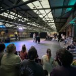 Teilnehmer:innen beim RUDEL.-Community-Event im Austausch – Workshop-Atmosphäre mit Vernetzung und Gesprächen