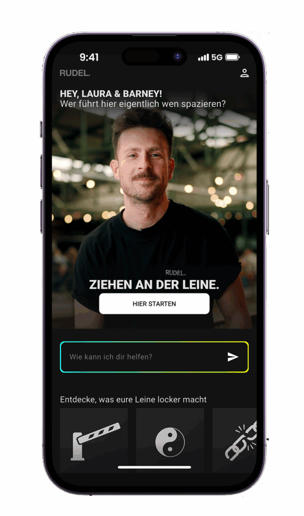 Screenshot des RUDEL. App-Moduls ‚Ziehen an der Leine‘: Interaktive Coachings mit Hundetrainer Tim Matschkowski. Personalisierte Ansprache in der App: ‚Hey, Laura & Barney! Wer führt hier eigentlich wen spazieren?‘ Mit Button ‚Hier starten‘ und Auswahlbereich darunter.