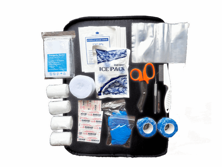 alle Inhalte des Erste Hilfe Kits von Kompressen über selbsthaftende Binden bis Werkzeuge wie Schere und Pinzette